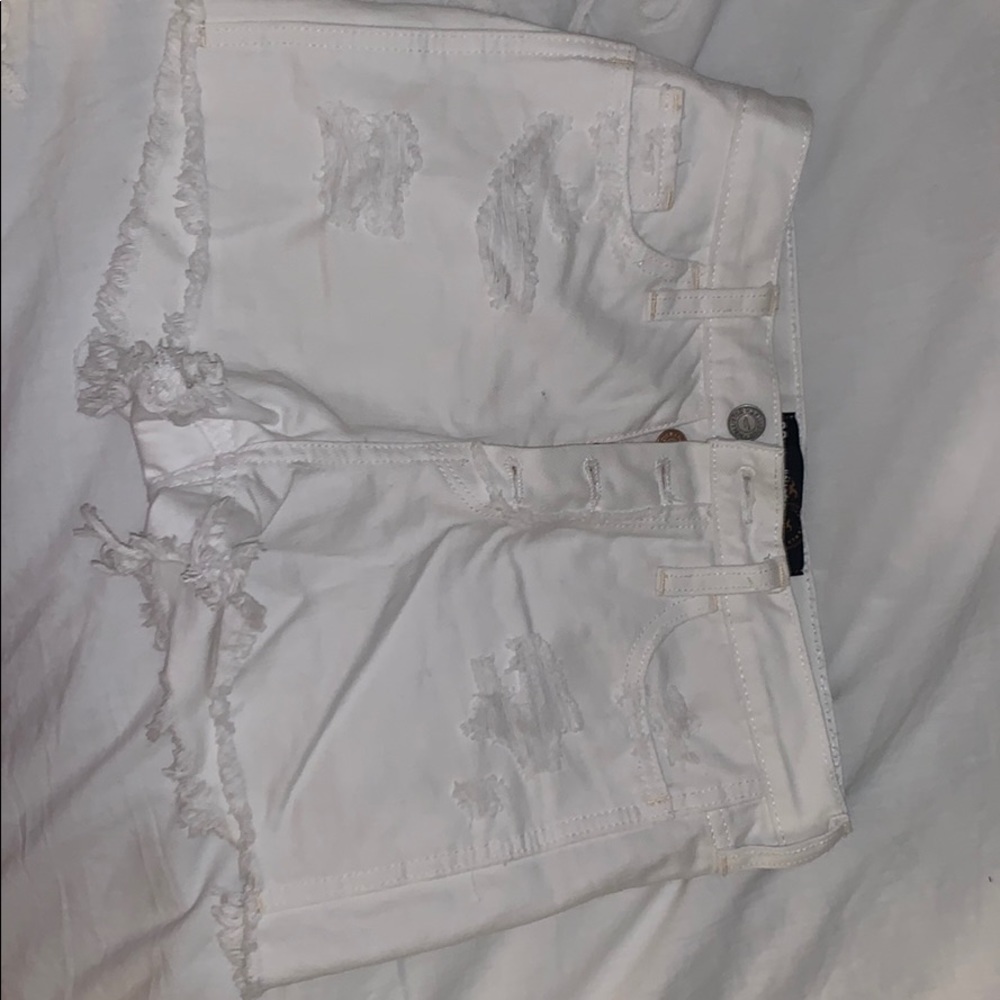 Hollister White high waisted shorts with rips